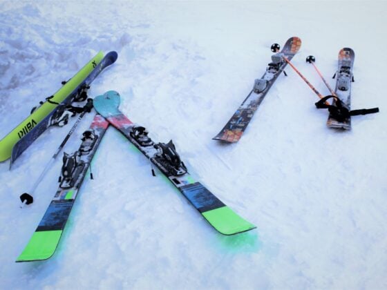 Skis and poles on snow