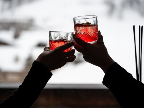 Chalet Le Rocher, person holding vibrant cocktail, Val d’Isère