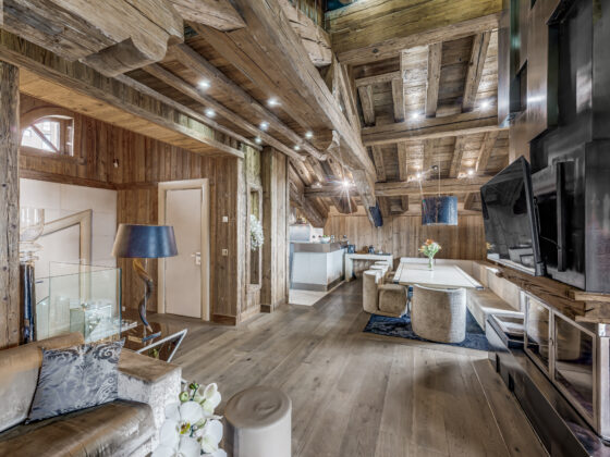 Living area seating with timber interiors and neutral tones – Carat – Courchevel 1850