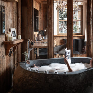 Chalet Lhotse, Hot tub reading. Luxury ski chalets in French Alps — book direct ski chalet French Alps