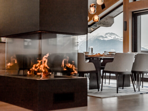 Chalet Bacchus fireplace Courchevel — book direct ski chalet French Alps